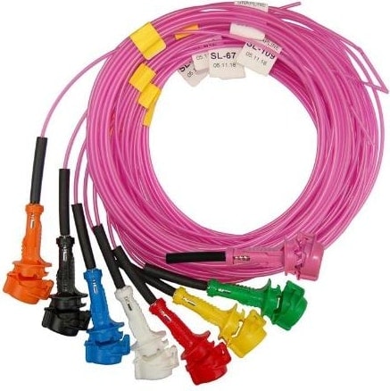 Coils of pink Orica Exel Connectadet signal tube with black-sheathed leads and coloured surface connector blocks